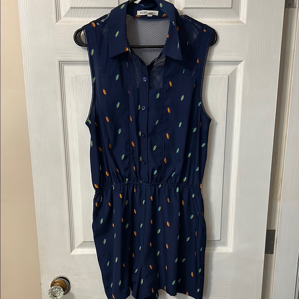 BCBGeneration Navy Mesh romper with a parrot print